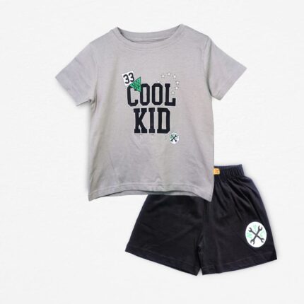 "Kids' gray T-shirt with 'Cool Kid NYC' print and black shorts set, made of soft cotton, perfect for casual wear."